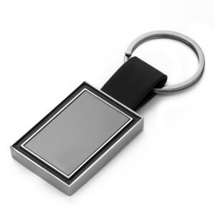 Chaveiro Metal com Al&ccedil;a MTB 15000 | chapinha central no grafite e verso liso.